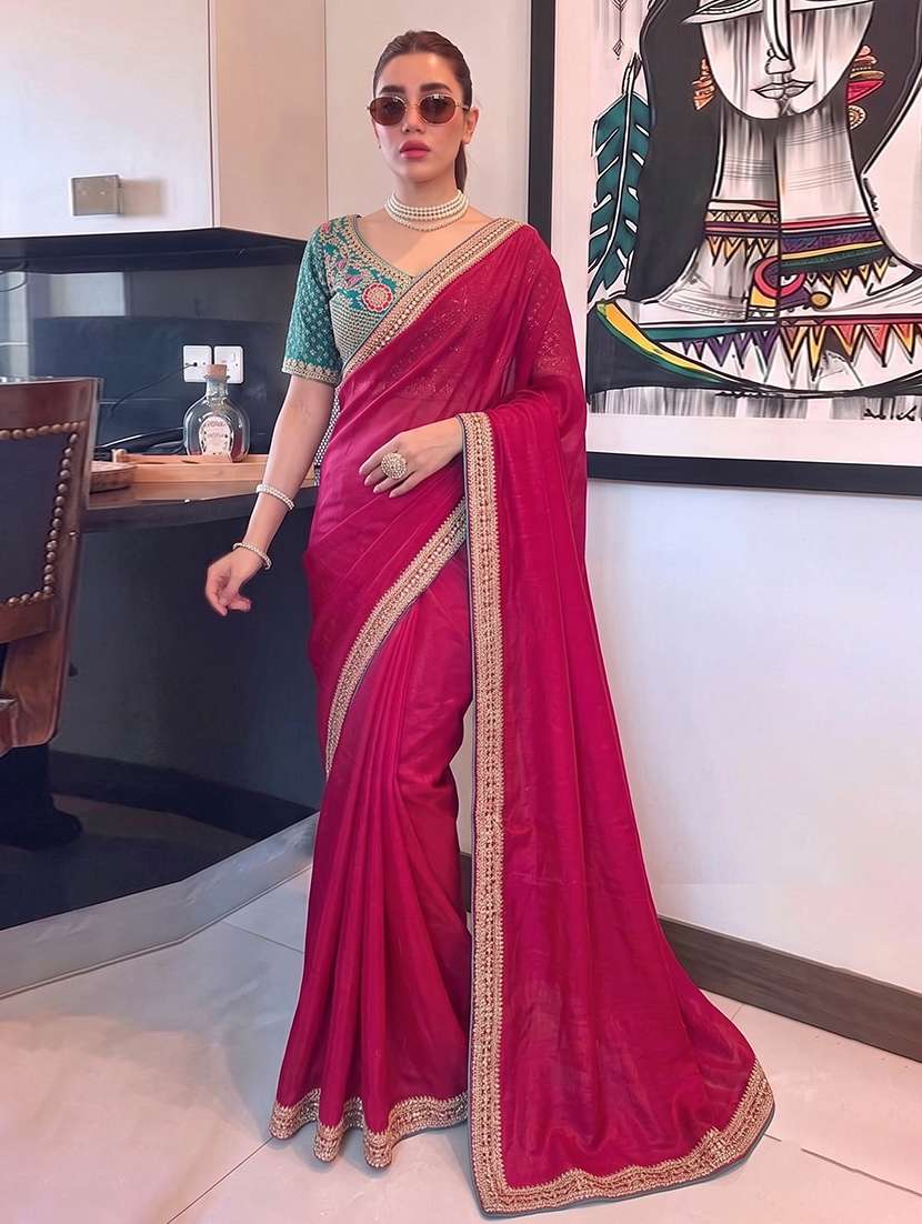 women solid with bordered saree with blouse