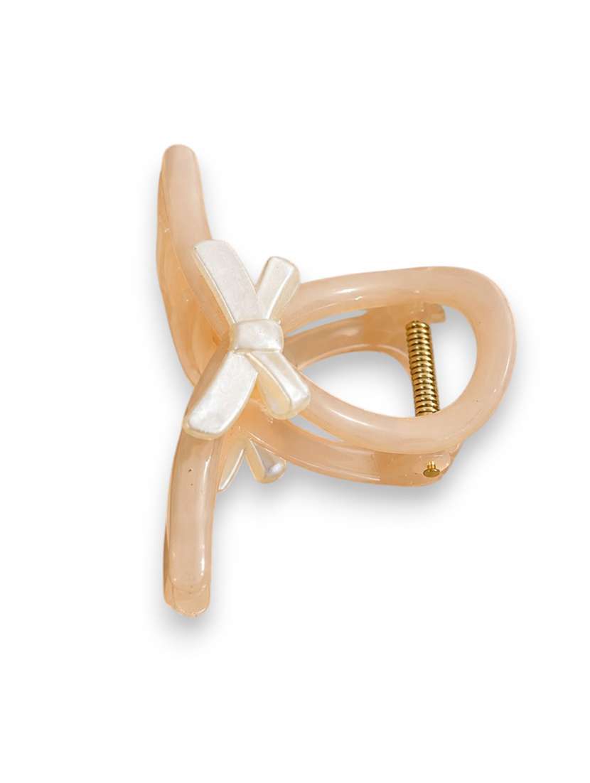 peach glossy bow design hair claw clip for women - 22639727 -  Standard Image - 1
