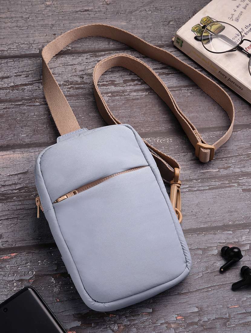 women solid sling bag with adjustable strap