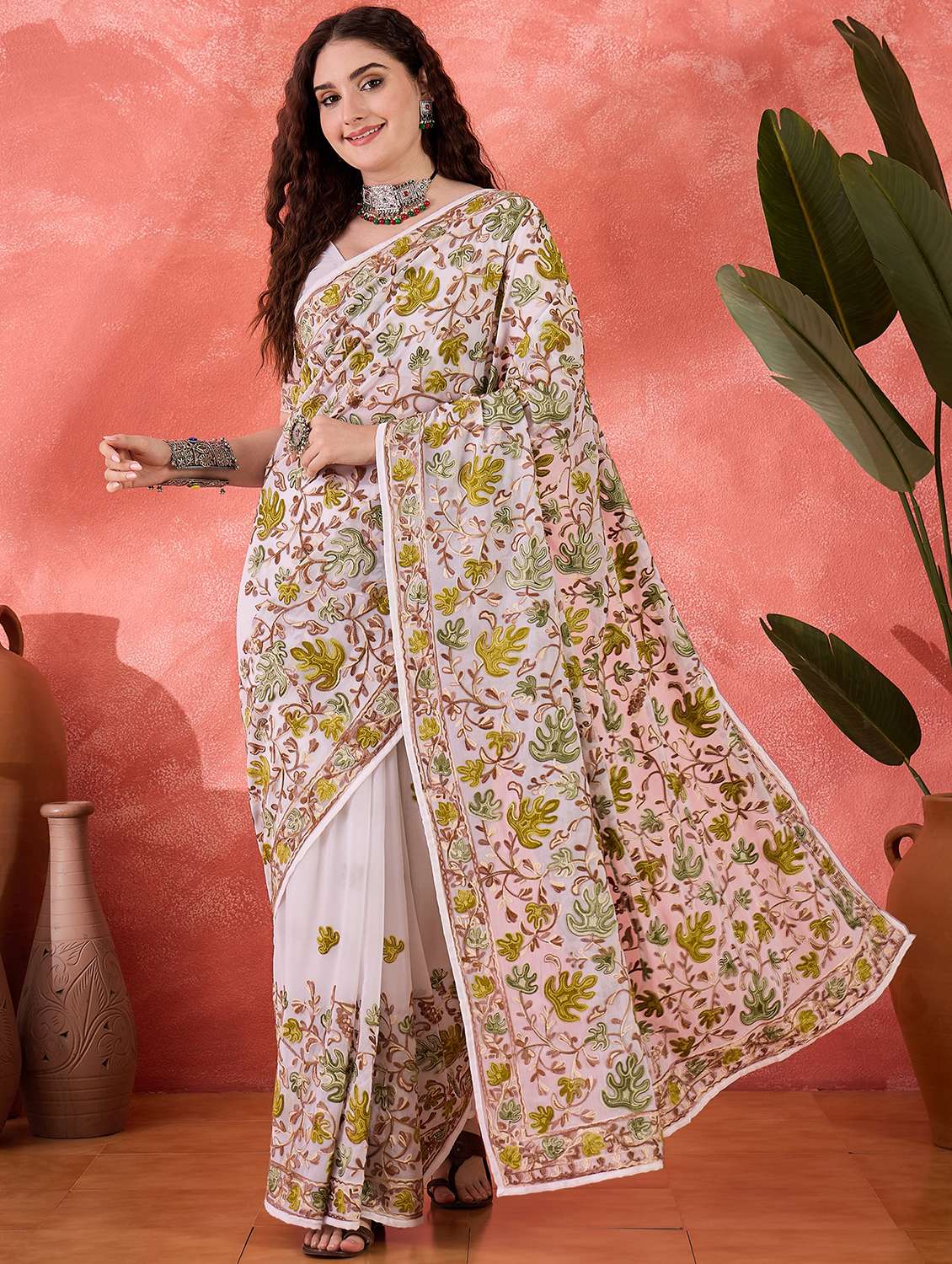 women solid with work embroidered saree with blouse