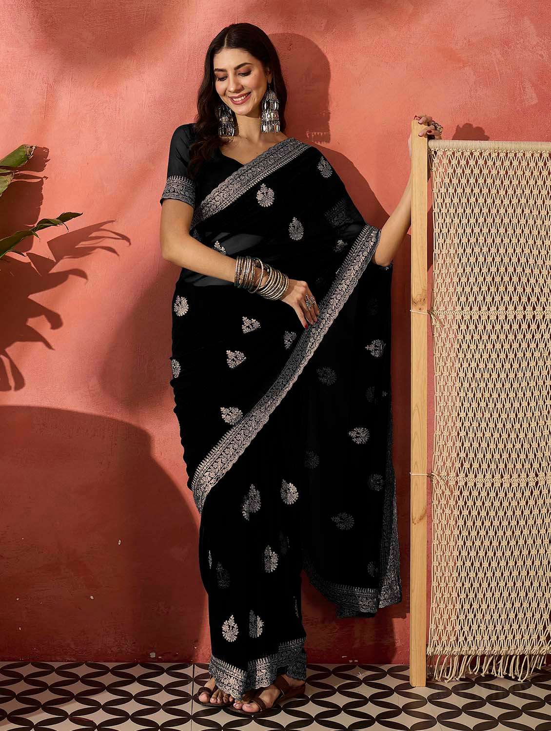 women solid with work embroidered saree with blouse