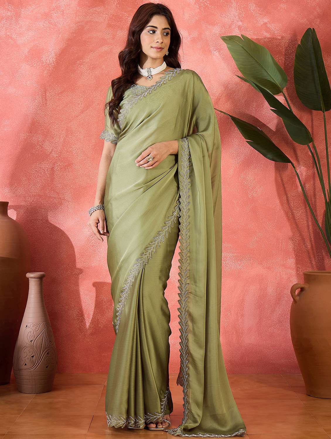 women solid with embellished bordered saree with blouse