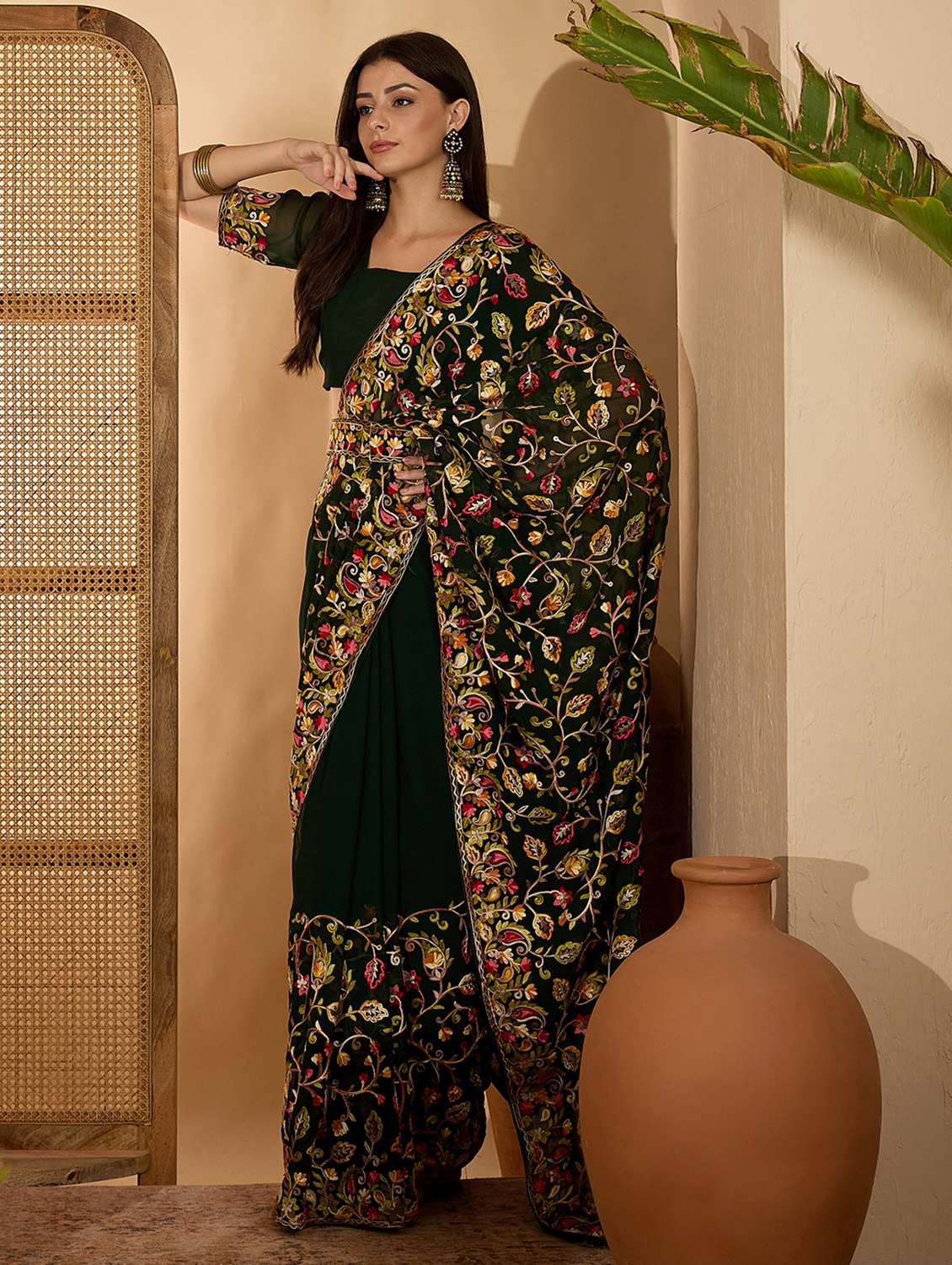 women solid with work embroidered saree with blouse