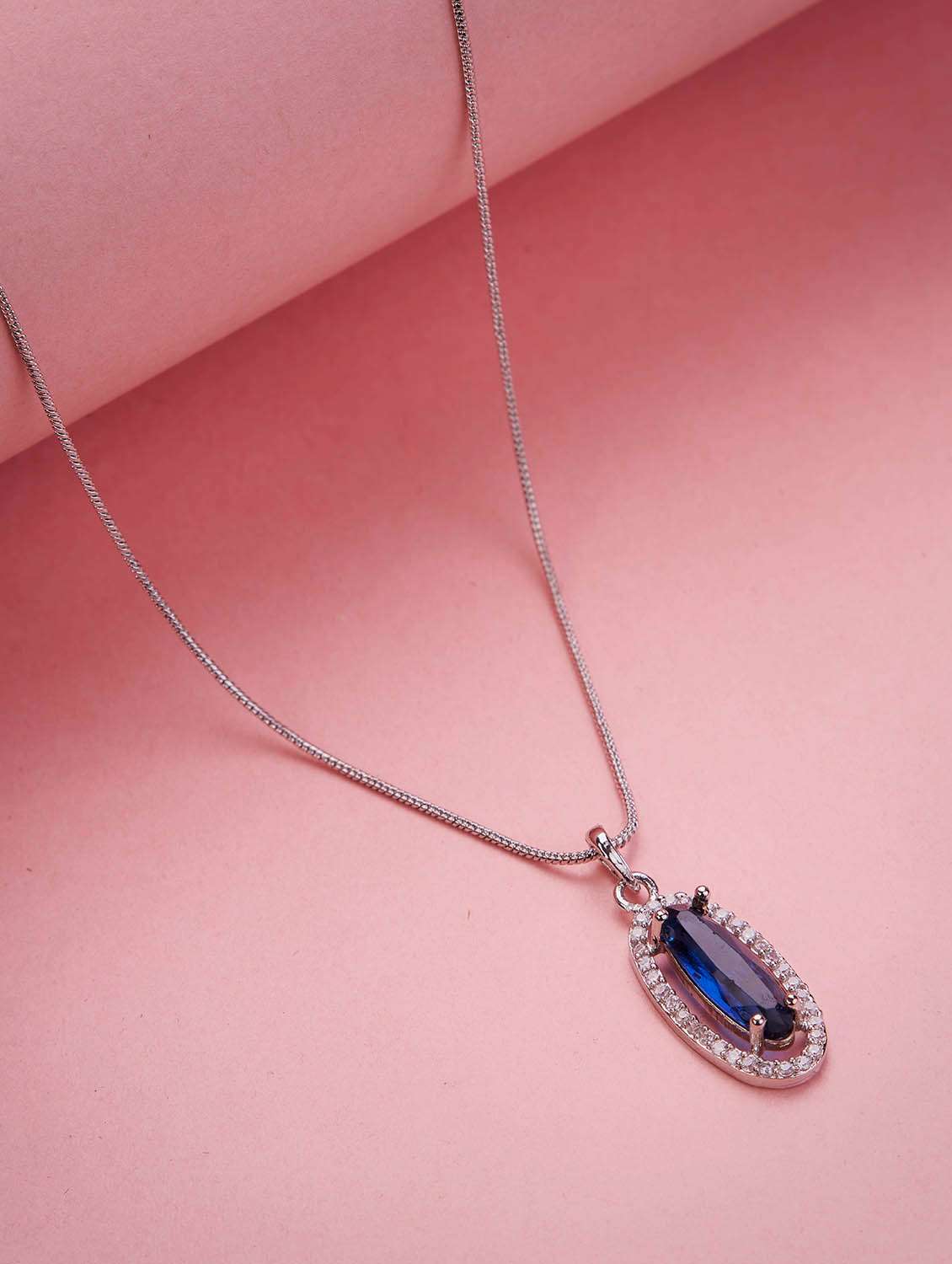 elongated oval halo design rhodium plated pendant with chain
