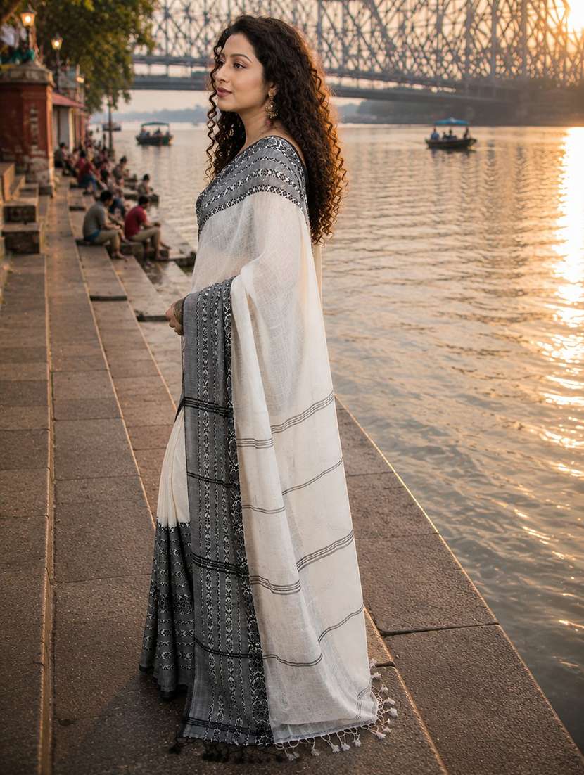 women solid with bordered handloom saree with blouse - 22665521 -  Standard Image - 1