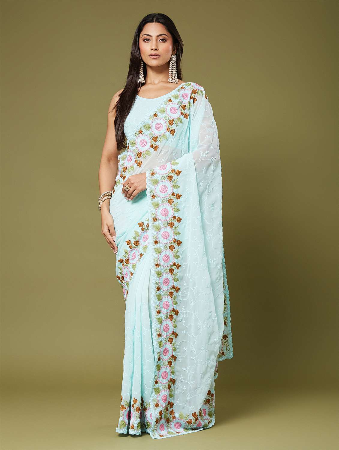 women solid with work embroidered saree with blouse