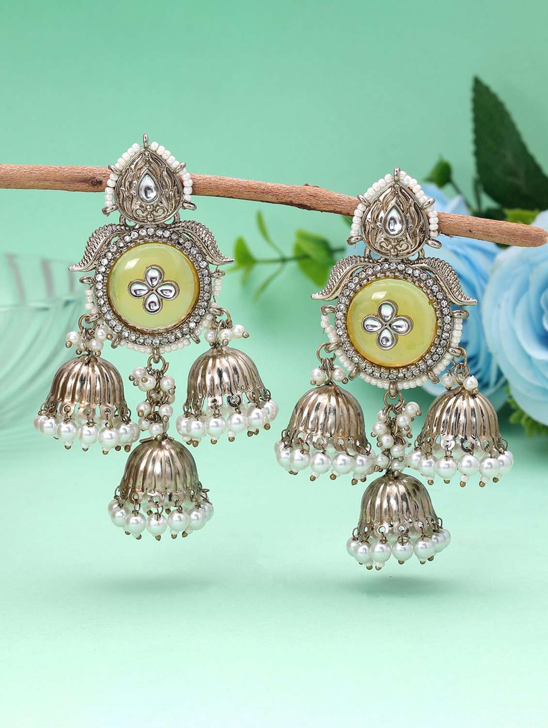women kundan and stone chandellier earrings