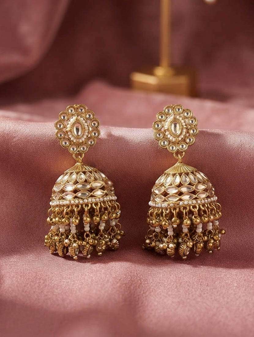 women kundan and stones jhumka