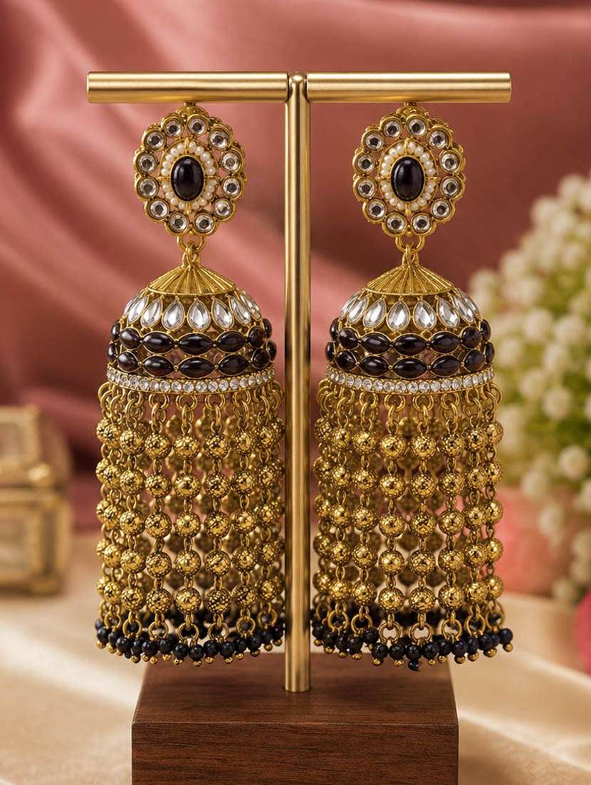 women kundan and stones jhumka