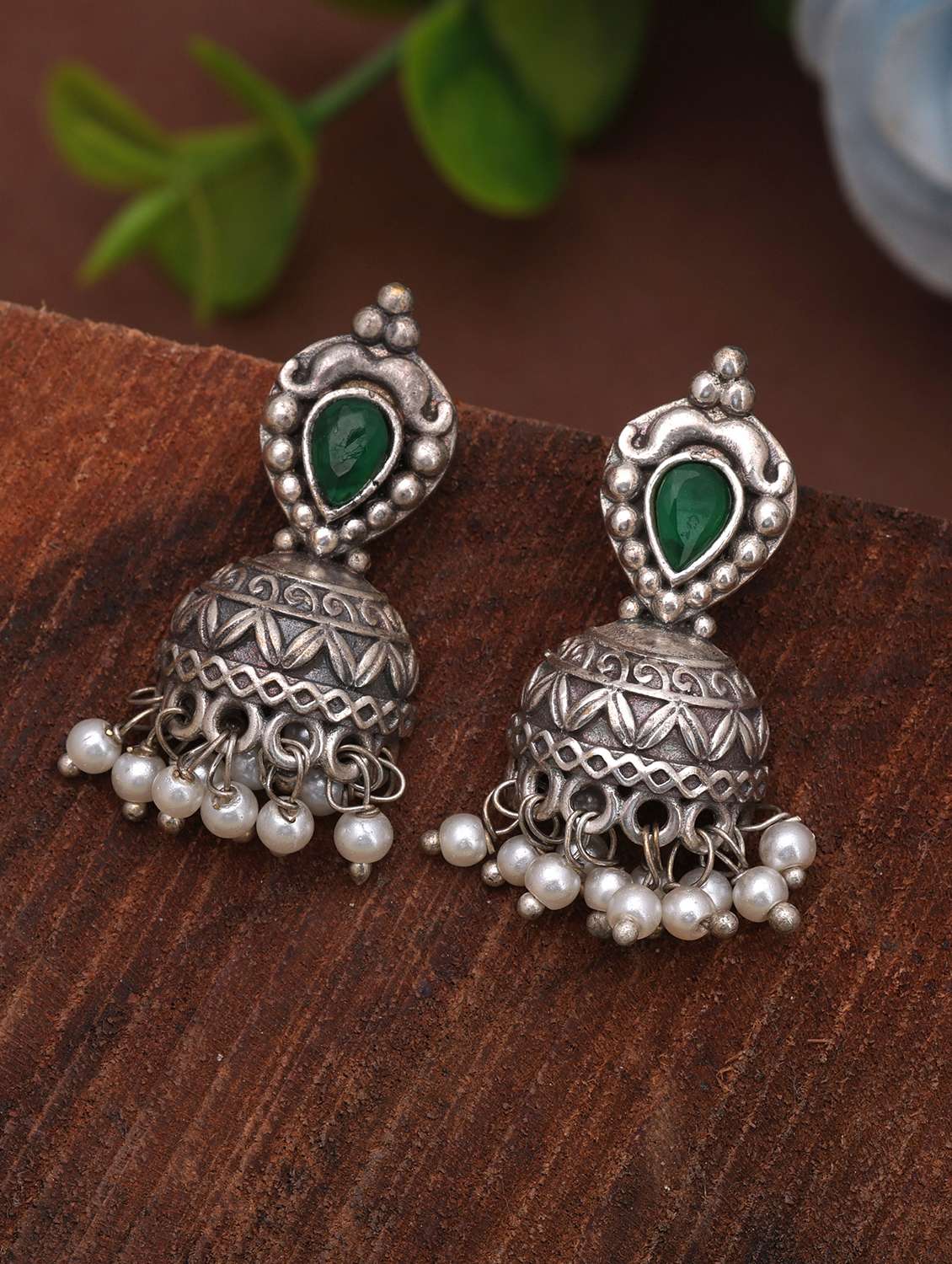 women oxidised green stone jhumka