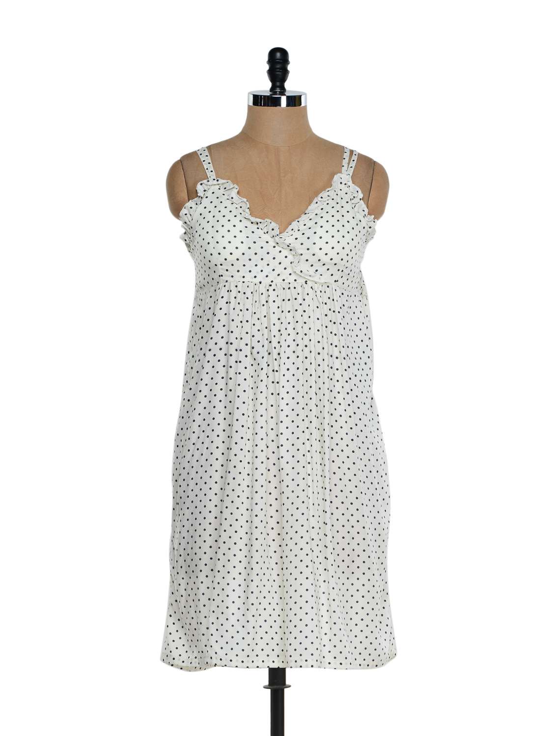 white and black polka-dotted dress