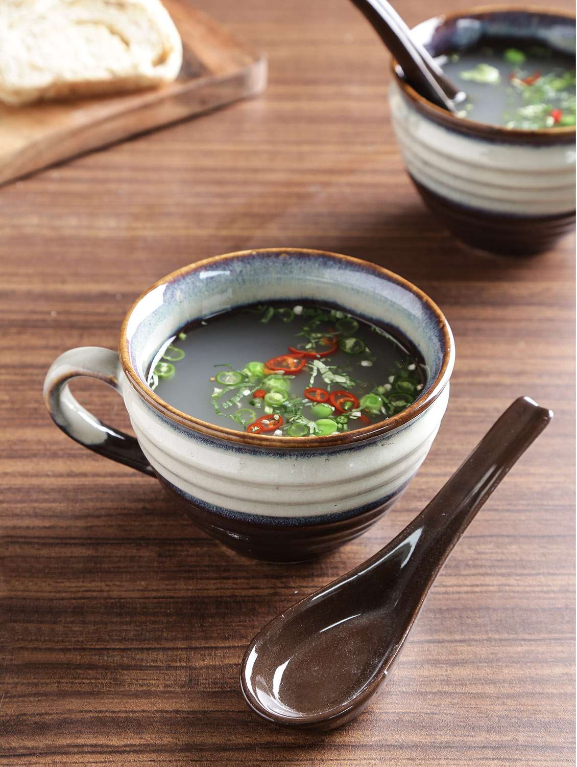 brown and off white ceramic studio soup set